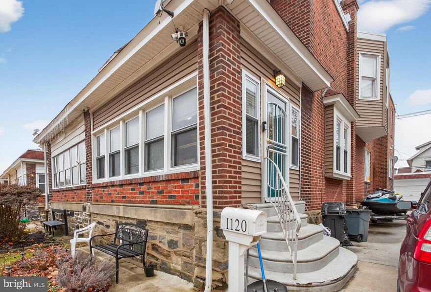 Welcome to 1120 Haworth Street, a 4-bedroom, 1-bath twin home located in Philadelphia. As you approach the home, a private driveway leads you to the front steps and entry. Step inside to the welcoming sitting room featuring hardwood floors, bright windows that fill the space with natural light, and a ceiling fan with light. French doors open into the living room, which showcases hardwood flooring, crown molding, and a fireplace that adds warmth and character. The dining room continues the hardwood flooring and includes a modern ceiling light and a bright window, creating a comfortable space for everyday meals or entertaining. Just beyond the dining room is the beautifully updated kitchen, complete with tile flooring, stainless steel appliances, an island with breakfast bar, beverage refrigerator, and updated finishes that create a functional and stylish cooking space. Upstairs, the second level features the primary bedroom with hardwood floors and a ceiling fan. The full bathroom offers tile flooring and a walk-in shower. Three additional bedrooms, all with hardwood floors, provide flexible space for children, guests, or a home office. The unfinished, walk-out basement includes the washer and dryer along with plenty of room for additional storage. Owned solar panels are transferable, and the home features a new HVAC system and roof installed just 1.5 years ago. The property also includes a detached one-car garage and a back patio. Conveniently located near local shopping, parks, grocery stores, restaurants, and more, this home also offers easy access to Route 1 and I-95 for convenient commuting. Don’t miss the opportunity to make 1120 Haworth Street your new home.