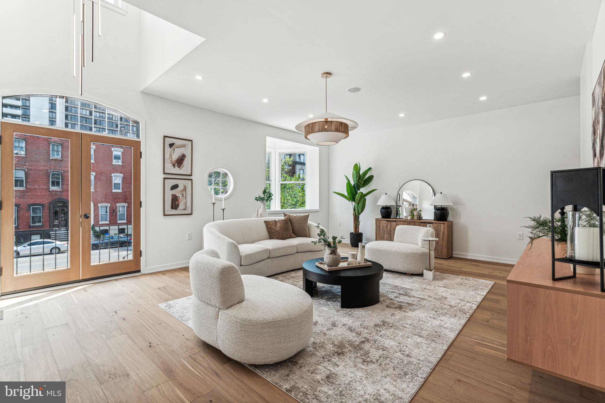 Welcome to 2023 Spring Garden Street! This stunning property offers an unparalleled living experience with luxury features throughout, 4 bedrooms and 4.5 bathrooms. Enjoy a massive yard with over 50 feet of private outdoor space, perfect for entertaining, gardening, or simply relaxing in your own urban oasis. The 25-foot width provides a spacious layout, offering ample room for all your lifestyle needs. When you step inside, you will immediately notice the gorgeous foyer with accent wall, the perfect place to welcome your guests. This floor offers 2 spacious bedrooms and 2 bathrooms, all with modern finishes and access to your large outdoor space. make your way upstairs to find the stunning living area, complete with a custom fluted accent wall, floating console, bay window allowing for tons of natural light and beautiful chandelier coming down from the vaulted ceiling. The one-of-a-kind European kitchen is beautifully designed with quartz coutnertops & backsplash, waterfall island with room for barstool seating, custom oak cabinetry, and top-of-the-line stainless steel appliances. Upstairs you will find a guest bedroom with en-suite bathroom and your luxurious primary suite. The primary suite boasts a fluted accent wall, custom floor to ceiling closet system, outdoor balcony, and spa-like bathroom. This bathroom truly has it all with double vanity sinks, multiple shower heads, stand alone tub and floor to ceiling tile. 2023 Spring Garden Street is complete with a partially finished basement, perfect for a home gym, home office, or extra storage space. With three distinct outdoor spaces, this home boasts a retreat from the city. Complete with the convenience of two-car parking, don’t miss the opportunity to own this exceptional property, schedule your showing today!