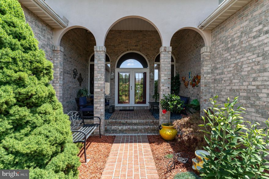 Welcome Home, to an immaculately maintained, corner-lot gem nestled within the desirable community of Penn National. This thoughtfully designed French-Style abode boasts a sprawling floor plan brimming with both cosmetic and system updates, sparing no expense in its luxurious finishes. The sky-high ceilings and abundance of windows create a warm and inviting atmosphere, flooding each and every corner with natural light. The main level hosts 3 bedrooms and 2.5 baths including the lavish primary ensuite. The primary bedroom is a retreat of comfort, offering his-and-her closets, a tray ceiling and access to a private patio. The ensuite bath features a spa-like oasis, complete with a walk-in shower, dual sinks and an additional vanity area. At the heart of this exquisite home lies a kitchen as elegant as it is functional. Adorned with custom cabinetry, gleaming granite countertops, a tasteful tile backsplash, an oversized central island, and a high-end appliance package this culinary masterpiece is designed to inspire. Whether you prefer quiet nights alone or entertaining friends and family, this home offers a variety of dining areas and living spaces to delight in. Enjoy the comfort of the main living room, the serenity of the library and the charm of the enclosed porch. The finished lower level is an extension of the home's living space, providing the opportunity for two additional bedrooms, a large recreational room, and an additional full bath. Ample storage remains in the unfinished portion of the basement, ready to cater to your every need. The Penn National Community enchants with its absence of association or fees, offering instead exclusive and optional a la carte access to a plethora of exceptional amenities. Enjoy, if you so choose, the outdoor heated pool, charming restaurant/bar, community garden, tranquil yoga studio, tennis/pickleball courts, engaging social clubs, and nearby hiking on the Appalachian Trail in Michaux State Forest. Embrace the perfect fusion of elegance, functionality, and idyllic community living in this absolutely stunning French-Style home.