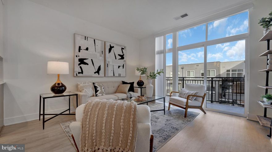 **VA ASSUMABLE LOAN WITH 2.375% INTEREST RATE.**  Experience modern living at The Haven at National Harbor, an award-winning resort-style community. This 2-bedroom, 2-bath condo features an open layout with a contemporary kitchen offering quartz countertops, stainless steel appliances, and a spacious island perfect for dining or entertaining. The primary suite includes a walk-in closet and an elegant bathroom with a glass-enclosed shower. The second bedroom and full bath provide great flexibility for guests or a home office. Enjoy your balcony overlooking the peaceful courtyard — the perfect spot to unwind. Residents enjoy top-tier amenities including a fitness center, yoga studio, outdoor pool, lounge, pet spa, and concierge services. Steps from the waterfront, MGM Casino, Tanger Outlets, and premier dining and entertainment. Easy access to DC and VA. Luxury and convenience meet right here at The Haven.