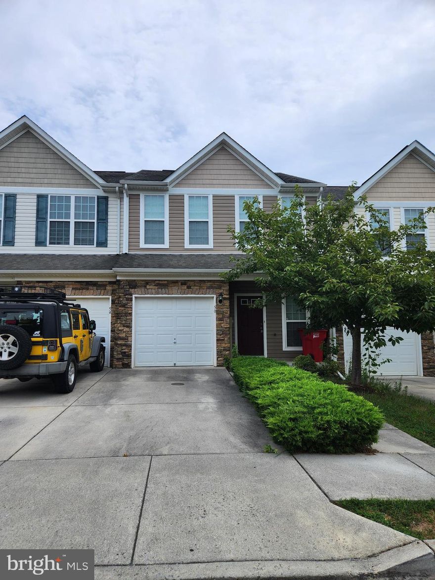 Beautiful townhome in Martinsburg features 2 bedrooms, 2 bathrooms, living room, kitchen w/dining area, laundry area, small yard and 1 car garage.