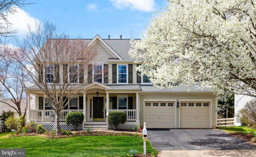 Welcome Home! This beautifully designed property offers the perfect blend of modern comforts and Southern charm, nestled close to shopping, dining, wineries, breweries, hiking trails, and more! From the moment you arrive, the extra-deep front porch welcomes you with its timeless appeal—the perfect spot to sip your morning coffee or curl up with a favorite book. A charming paver walkway leads you inside, where gleaming hardwood floors and elegant finishes set the tone for this exceptional home.  The main level boasts a formal living and dining room, along with a light-filled open family room that flows seamlessly into the custom  kitchen. A chef’s dream, this space features stainless steel appliances, a stylish backsplash,  heated floors, and an adjoining breakfast area .  The  slate patio creates the perfect setting for outdoor gatherings. A main-level mudroom keeps everything organized and tucked away. Upstairs, the spacious primary suite has two  walk-in closets and a spa-like en-suite bath. Three additional bedrooms share a full bath.   The basement has been designed for versatile living.  It features a dream laundry room, an inviting library nook, and a  bonus room that can be used as a home office, guest room or craft room!   The rec room provides plenty of space for fun and relaxation, while a full bath and a dedicated storage room add extra functionality. With a two-car garage, a picturesque setting, and a location that blends country charm with modern convenience, this home is truly one of a kind. Don’t miss your chance to make it yours!