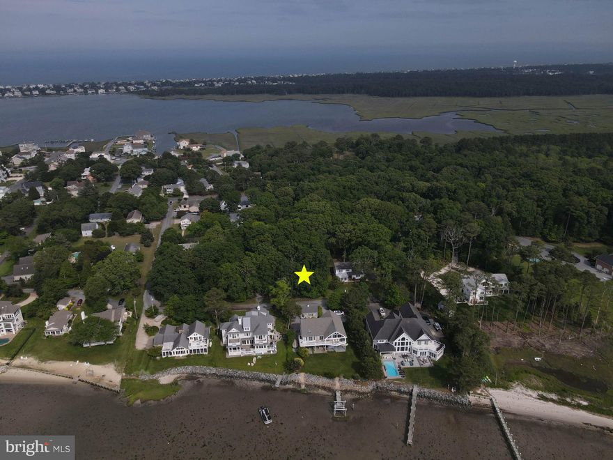 Discover the perfect blend of privacy, nature, and coastal living with this 0.23-acre wooded lot in Ocean View, Delaware. Tucked away on a quiet street just moments from the Indian River Bay, this parcel offers a rare opportunity to build your dream home with deeded water access—giving you the ability to moor a boat right out front via shared waterfront rights.

Set amid mature trees and natural surroundings, this homesite offers a peaceful setting with potential water views and unbeatable proximity to some of the area’s top outdoor attractions. Just around the corner, the James Farm Ecological Preserve invites you to explore scenic trails, wildlife habitats, and boardwalks through preserved coastal marshlands. A short drive takes you to Bethany Beach and its classic boardwalk, where dining, shopping, and summer fun await.

This lot comes with no HOA, no builder tie-in, and all the freedom to design a home that suits your vision—whether you're planning a weekend escape or a full-time residence near the water. Launch your next adventure in a neighborhood that offers the quiet of nature with the convenience of coastal living.

Bring your builder and your boat—this is where the best of Delaware’s bay life begins.