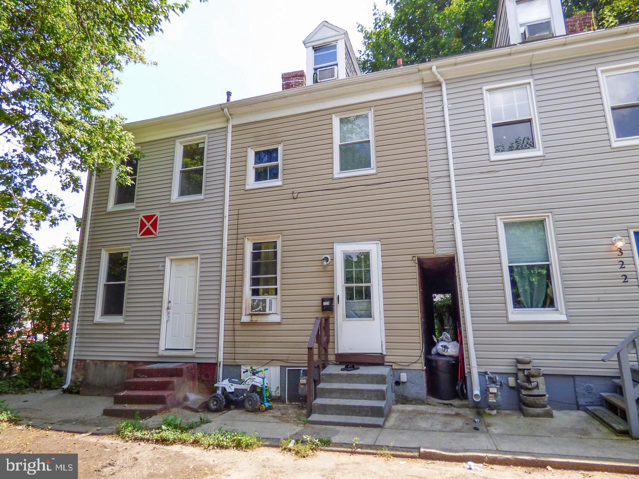 This great maintenance free, occupied investment property is tucked away in it’s own pipe steam off of N. Pine Street in York City. This 3 bedroom, 1 bath 2 1/2 story townhouse built in 1900 was remodeled with all new maintenance free windows, laminate floors, an updated kitchen & bath, a full unfinished dirt floor basement (which is typical of this area), a newer 50 gallon electric water heater installed in 2021, an updated 100 AMP electrical system with circuit breakers, a shower/tub combo & a finished bedroom on the 3rd floor. This unit presently rents for $1,255 & is kept neat & clean by the tenant who lived here over 1 year & would love to stay. There is a $1,255 security deposit which shall be transferred to the new investor. This property pumps out an impressive 10.9% cap rate! With numbers like this all you can say is: YES! According to the tenant the end unit with the ‘no entry’ sign immediately adjoining this subject property has been & continues to be slowly renovated by an investor over the last year & half. Be sure to ask your agent for a copy of the Cap Rate sheet, the written lease, the SPD & the Lead Based paint doc - all of these pdfs should be a simple download in the associated docs section in the MLS. Tenant pays all utilities including: electric, gas, water, sewer & garbage. Owner pays taxes & insurance. Don’t miss out on this great cash flow property on a quiet street in York City just a few blocks from the Revolution Baseball stadium!
