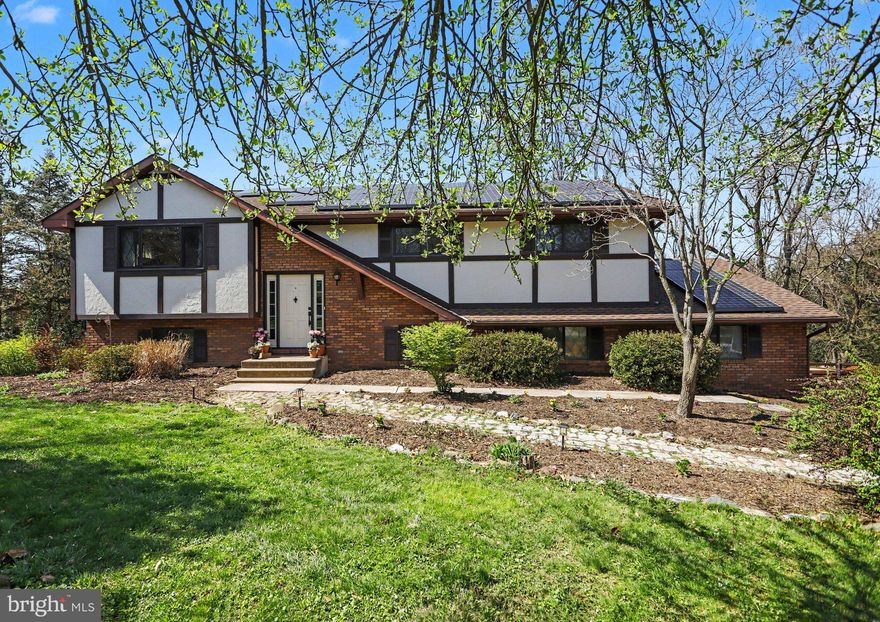 Welcome to 5007 Snyder Mill Road in Spring Grove!  This beautifully maintained home, located in the highly-desirable Southern York County School District, offers comfort, efficiency, and versatile living space both inside and out.  You won't find another one like it!

Step onto the main level and enjoy rich Brazilian Cherry hardwood floors that flow throughout, creating a warm and inviting atmosphere. This level features three spacious bedrooms and two full bathrooms, providing convenient one-level living. The kitchen is thoughtfully designed with a ceramic tile backsplash, baker’s counter, stainless steel microwave, glass cooktop, and a new dishwasher. A sliding door leads directly to a covered deck—perfect for relaxing or entertaining while overlooking the backyard.

The finished lower level expands your living space with a cozy family room centered around a wood-burning fireplace. Sliding doors open to a hardscaped patio and a scenic backyard complete with a fish pond and a chicken coop, offering a peaceful outdoor retreat. This level also includes a fourth bedroom, a third full bathroom, a laundry room, and a mudroom/storage area with direct access to the two-car garage. Durable Home Depot LifeProof flooring enhances the family room, hallway, and fourth bedroom.

This home is packed with valuable upgrades and efficiency features, including replacement windows on the main level and a new front door, both of which were installed by Renewal by Andersen and include a transferable warranty.  There are also fully paid-off Tesla solar panels, keeping electricity costs to approximately $50 per year; a new HVAC system, installed in 2025; a roof replaced in 2004 with long-lasting 50-year shingles; and Hardie Board Siding, which will provide years of trouble-free maintenance.

Combining thoughtful updates, energy efficiency, and flexible living spaces, this property is ready to welcome you home.