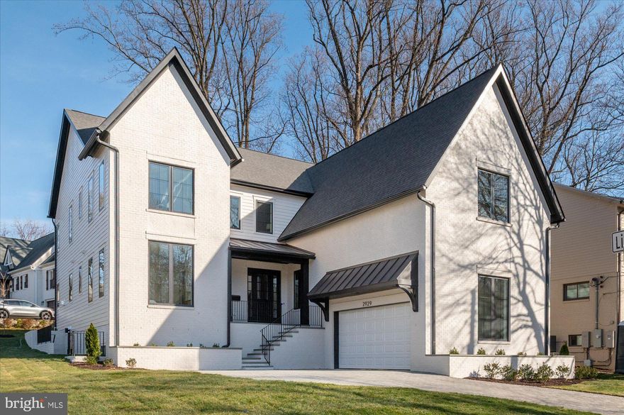 Cherry Hill Custom Homes presents this beautiful new construction home in a super-convenient North Arlington location. This home features 6 bedrooms, 6 full bathrooms, and two powder rooms with 7,030 square feet of finished living space over three levels. The main level includes 10ft ceilings, gorgeous wide-plank engineered white oak wood floors, a beautiful gourmet kitchen with frame-less custom cabinetry and quartz countertops and a rear prep kitchen and pantry. The kitchen overlooks a spacious great room with coffered ceiling and gas fireplace with tile surround and a large dining area and butler's pantry surrounded by windows offering abundant natural light. The bluestone patio off of the great room provides an amazing outdoor living space overlooking the backyard. A guest suite, private study, and mudroom with built-in cubbies complete the main level living spaces. The upper level is highlighted by a luxurious primary suite with spacious dual walk-in closets with built-ins, a spa-like bathroom with heated floors, double vanities, stand-alone soaking tub, and heavy glass enclosed shower. The lower level includes a recreation room with wet bar, golf simulator space, exercise room, an additional en-suite bedroom, and a separate powder room.  Convenient to Lee Harrison Shopping Center, Chestnut Hills Park, Knights of Columbus, Washington Golf, and much more. Discovery ES/ Williamsburg MS/ Yorktown HS.