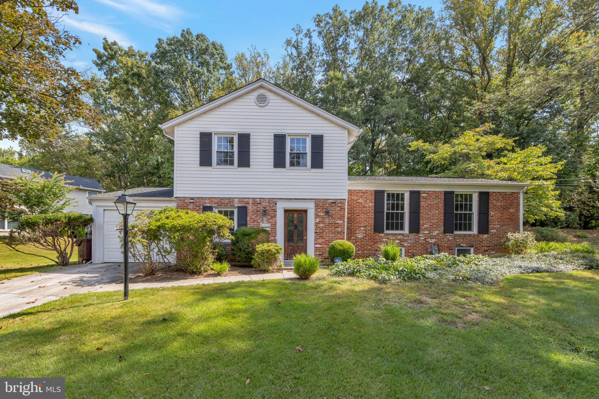 Beautiful spacious split level in one of Montgomery County's most prestigious subdivisions. Located within the top-rated school districts and on a premium .4-acre lot boasting a large, private walkout backyard and mature landscaping. Offers 3,000 square feet of living space over 3 finished levels. Gleaming hardwood floors, recessed lighting, and spacious family living spaces set the tone, with newer windows letting in tons of natural light. The entry-level features a large family room with walkout to the backyard, 1 bedroom, and a powder room. The kitchen is located just a few steps up from the family room and opens to an oversized living room and dining room with a second walkout point to the backyard. The top level of the home provides 4 bedrooms and 2 full bathrooms. Best location, walk half a block to Tilden Woods Park & Pool, providing a swim club, tennis courts, basketball courts, baseball field, tot-lot, walking trails, and a community center. Easy access to an abundance of dining, shopping, and entertainment options, including, Pike & Rose, Cabin John Shopping Center, Wildwood Shopping Center, Rockville Pike, Montgomery Mall, and Cabin John Regional Park. Perfect for commuters, just minutes to I-270, I-495, White Flint Metro & Grosvenor Metro. Top-rated MOCO school district.