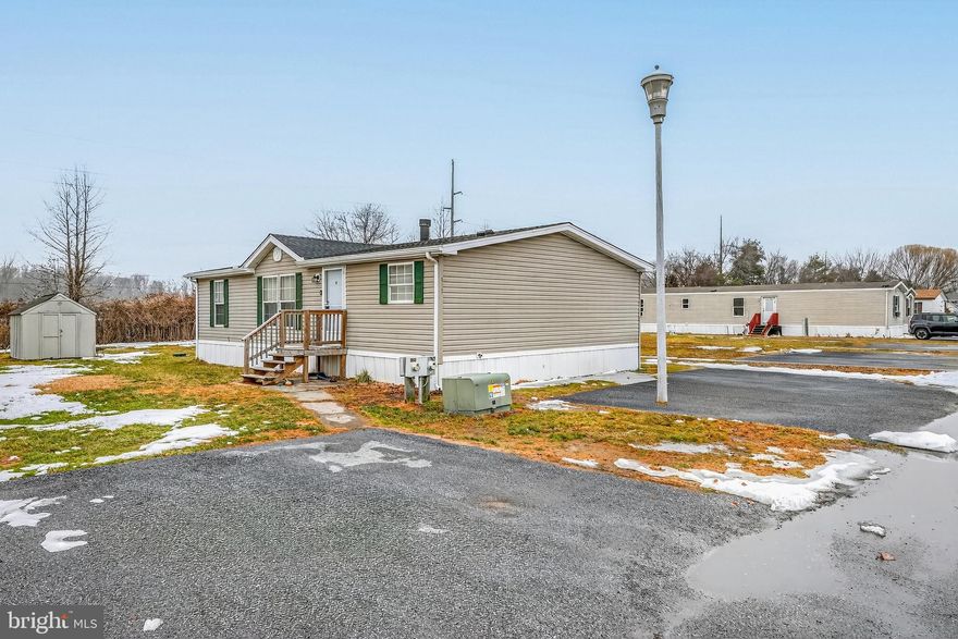 Completely renovated in 2024, this beautifully updated double-wide home is tucked away in the back of a well-maintained, desirable community—offering privacy and peace of mind. Nearly everything is new: roof (2024), HVAC (2024), all appliances (2024), plus a fully remodeled kitchen and bathrooms finished with modern touches. Stylish laminate plank flooring runs throughout, creating a cohesive, low-maintenance living space. Propane heat keeps utility costs efficient and comfortable. Lot rent is $636/month and includes trash, water, and sewer. This move-in-ready home delivers the feel of new construction at an affordable price point—just unpack and enjoy.

Photos should be uploaded by Wednesday