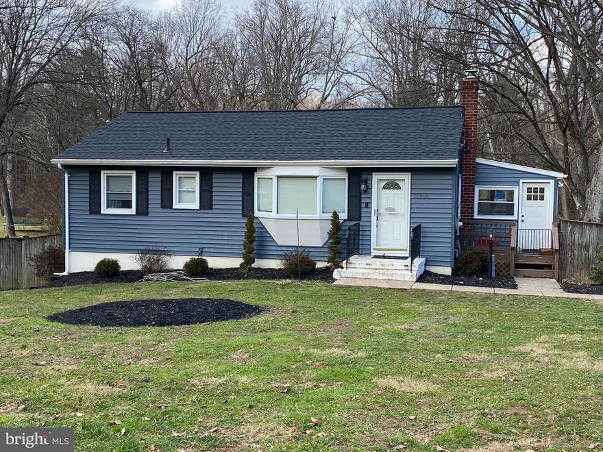 OFFERS DUE BY 2:00 TUESDAY, FEBRUARY 6.  This delightful rambler is situated on a half-acre lot on a no-thru street and boasts new siding, a new roof, a beautifully remodeled bathroom on the main level, wood floors and white kitchen with granite countertops and stainless appliances.  The walk-out basement is fully finished with a recreation room, bedroom, laundry, full bath and storage area.   The huge, flat rear yard is fully fenced.  This neighborhood is a hidden little gem and so convenient to I-95 and Rt. 29.  HOWARD COUNTY SCHOOLS!