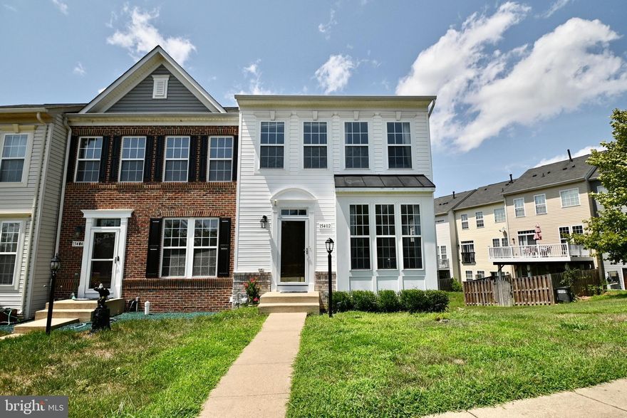 Price reduced. 
Welcome to the this well kept End unit townhouse in the sought after Rippon Landing community.    A great location close to Potomac Mills mall, I-95, library and multiple other stores.  A great location for the commuters  This house is situated right across a large well maintained community  pool and  gym.   Gleaming hardwood floors on the main level.   Fireplace in the family room. which is next to the dinning room.  SS appliances in the kitchen.    Basement has a full bedroom/full bath  and a wet bar.  Could be used as in-law suite or for rent.  Amenities include a pool, gym,  and tennis court.  Close to the elementary and middle school.   One hour notice is required.