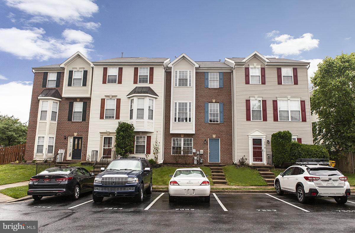 GREAT LOCATION, Attractive 3 level townhome w/brick front features hardwood floors Main Leve and stairwells living room/diring room with bright Morning room with 42" cabinets.Massive deck off Kitchen master suite with Large walk-in closet and 4th bedroom option w/half bath and walk out to patio Parking including 2 Reserved Spots Close to all the Major Road 100.95,295,695 and BWI