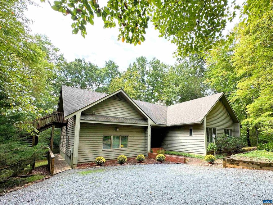 Experience serene living on 2.58 park-like acres in Stoney Creek. This thoughtfully renovated, single-level home, quality-built by Tectonics II, offers three bedrooms, including a spacious and private primary suite with a spa-like ensuite and generous closet space. On the opposite side of the home, you'll find another bedroom and a second primary suite, providing comfort and privacy for all.  The versatile den is ideal for a home office or guest room. The beautifully upgraded kitchen, featuring granite countertops and custom cabinetry, is perfect for entertaining. Cozy up by the fireplace in the living room, or unwind in the sitting area of your primary suite. A unique conditioned bonus room with a private outside entrance offers endless possibilities, from a yoga studio or artist?s retreat to a kid's hideaway or extra workspace.  Warm oak flooring and light-filled rooms throughout the home create a welcoming ambiance. The connection to nature is enhanced by mature landscaping, a screened porch, and a hot tub. A detached 660 sqft garage provides ample space for your vehicles and additional storage.  This home seamlessly blends comfort and natural beauty, conveniently located in Nellysford, and just 35 minutes to Charlottesville!,Granite Counter,Wood Cabinets,Fireplace in Family Room