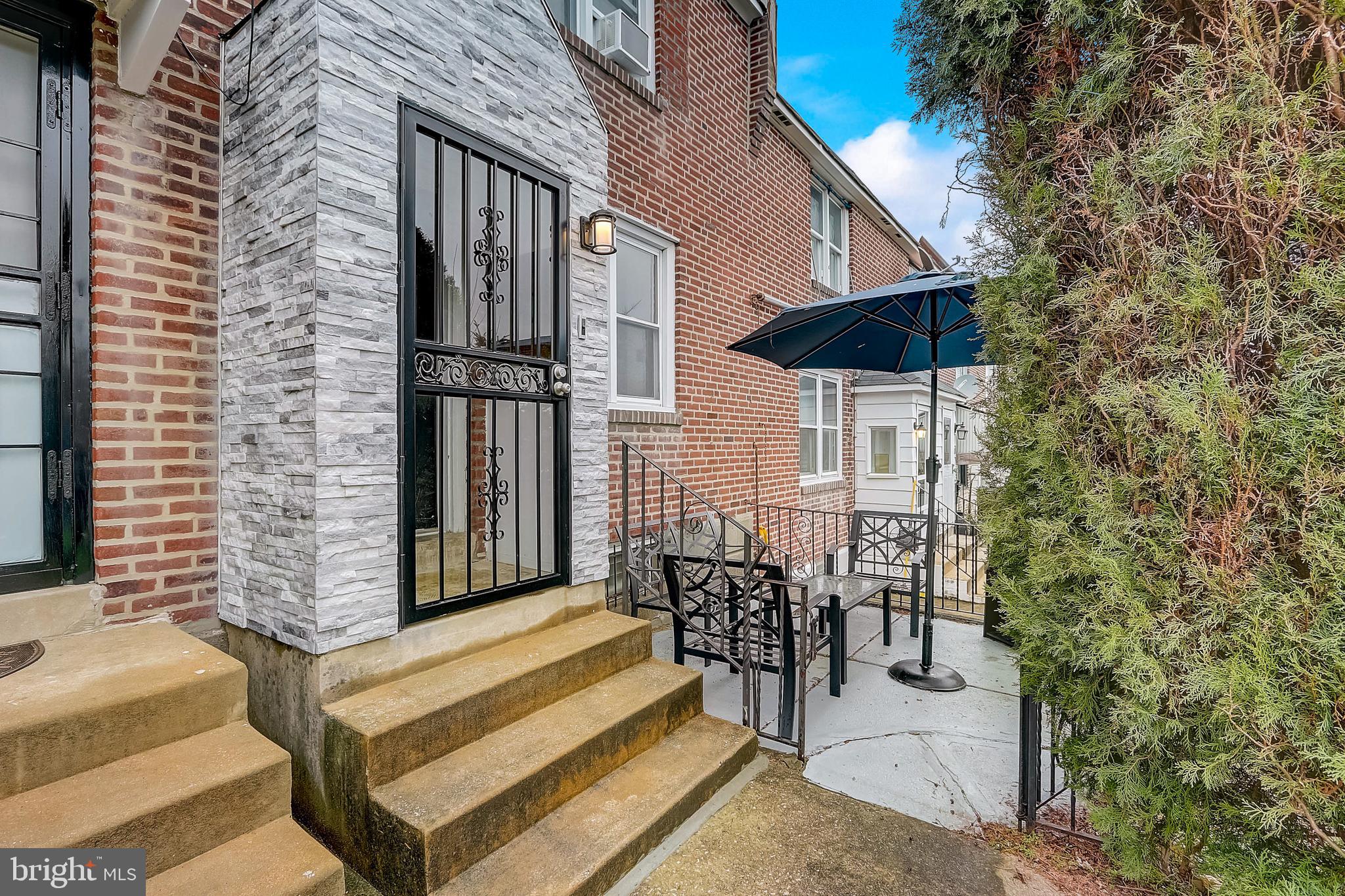 Welcome home to this beautifully updated rowhome in Overbrook Park! Enter from the front patio—an ideal spot for your morning coffee—and into the bright living room featuring classic hardwood floors. The open-concept dining room, complete with a beautiful chandelier, seamlessly connects the living space to the remodeled kitchen. The kitchen boasts gorgeous white tile, granite countertops, a tiled backsplash, plenty of white cabinetry, and newer stainless steel appliances, including a brand-new, never-been-used dishwasher (installed but not yet hooked up). Open shelving and a breakfast counter add a modern touch. Upstairs, you’ll find three bedrooms with hardwood floors and a remodeled full hall bath featuring tiled walls, a new vanity, and a glass-enclosed tub/shower combo. The fully finished basement offers incredible flexibility—use it as a family room, home office, gym, home theater, or even a fourth bedroom. The basement includes a full bathroom with a glass-enclosed stall shower and features durable, stylish LifeProof LVP flooring installed in 2022. Additional updates include redone treads on the stairs to the basement, fresh paint throughout the entire home, and a newly painted garage interior with a brand-new garage door. Major systems have also been thoughtfully maintained: both the HVAC and hot water heater are only six years old, and a new chimney liner has been installed for the heater, giving added peace of mind. Conveniently located close to Rose Playground, SEPTA's 69th Street Terminal, shopping, City Avenue, and with easy access to Center City and University City, this home truly checks all the boxes!