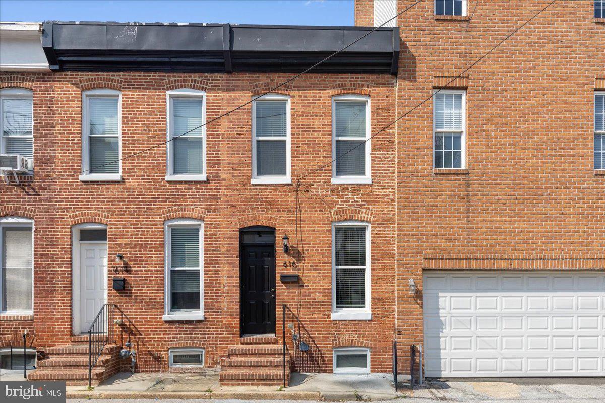 Stunning renovated brick rowhome in the heart of Federal Hill, showcasing high end finishes throughout. This beautifully updated home features exposed brick walls, recessed lighting, crown molding, and gleaming hardwood floors. The gourmet kitchen is a chef’s dream with granite countertops, stainless steel appliances, and a spacious dining area. Upstairs, the primary suite offers a luxurious spa like bath, along with a second bedroom and full bath. The finished lower level includes two additional bedrooms and a full bath, perfect for guests or a home office setup. Enjoy water views from the rooftop deck, ideal for relaxing or entertaining. A true gem in a prime location!