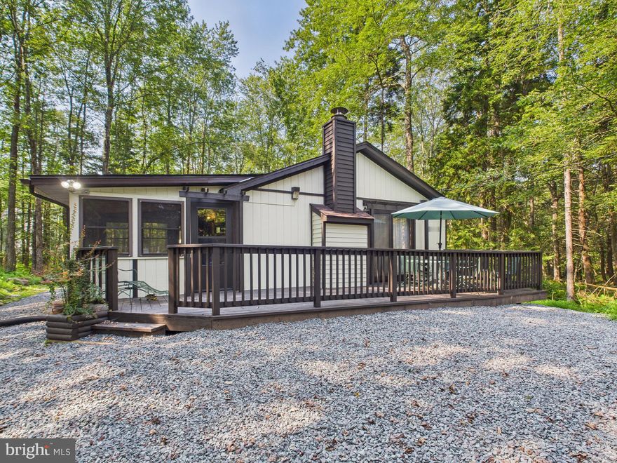 Ranch home in the gated, amenity-filled community of Arrowhead Lake. This home is on a greenbelted lot of 2.15 acres on a cul-de-sac! Home is 3 bedrooms, 1 bath and has a deck with a 3 season room. Living room has a propane fireplace. Dining area has sliders to the front deck. Kitchen has an eating bar, 2 sinks and laminate floors. Bar area with a wet sink. Full bath has a stackable washer/dryer. Three bedrooms complete the home with one having sliders to the back deck. Outside features a stone driveway, a shed and an oversized green belted lot. Walking distance to pool! Very private location! Extras include new grinder pump, new decking, new roof in 2025, and home on community sewer.

Arrowhead Lake is a gated community with security, 3 heated swimming pools, 2 lakes for fishing/swimming and boating, tennis courts and bocce ball. Many of these activities have occurred over the years including bonfires, carnival, Zumba, water aerobics, swim team, potluck dinners/breakfast and summer camp.