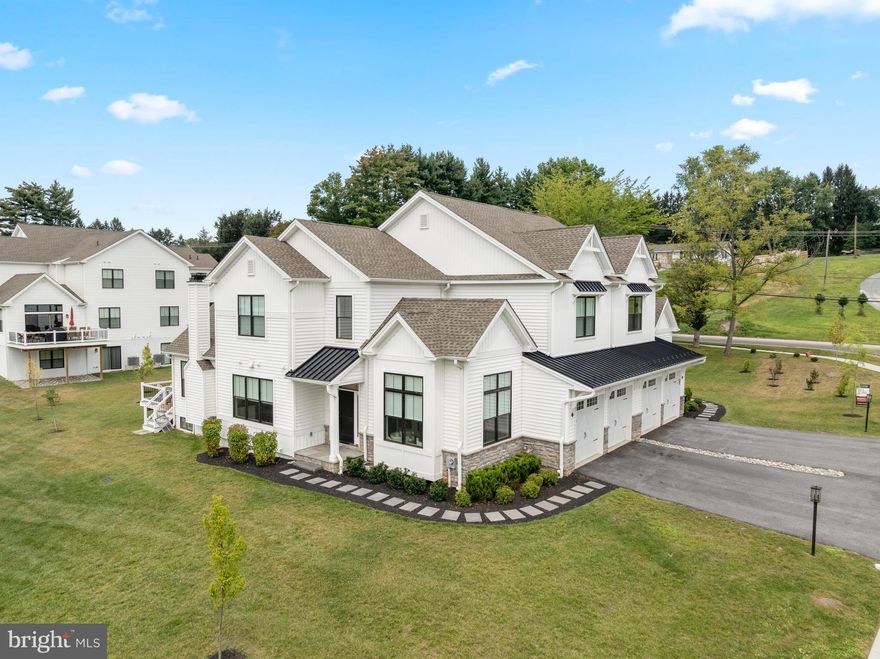 Welcome to 45 Sawmill Court, a stunning custom home in one of West Chester’s most desirable low-maintenance communities. Thoughtfully designed and extensively upgraded, this refined residence blends sophisticated finishes with modern comfort, offering the rare opportunity to own a turnkey property just two miles from the Borough of West Chester.

This sun-filled home features a first-floor primary bedroom suite with two walk-in closets and a spa-inspired bath complete with a large walk-in shower and upgraded finishes. The heart of the home is an elegant, open-concept kitchen featuring upgraded Century Carriage House cabinetry in a two-tone finish, a dramatic Level 9 Cambria Quartz Skara Brae island, Thermador range, refrigerator, dishwasher, microwave drawer, farmhouse sink, and a vented grotto hood. Soaring ceilings and walls of Marvin windows with sunny southern exposure fill the family room, kitchen, dining area, and home office with natural light.

Additional features include a fully finished basement with custom wine storage and built-in cabinetry, a stone fireplace that extends to the ceiling, primary bedroom ceiling beams, a first-floor laundry room with an interior closet, and an upgraded trim package throughout, featuring mudroom cubbies, a full 12’ shadow box wall in the study, and 6-inch baseboards. All bathrooms and the powder room are enhanced with upgraded countertops, tile, fixtures, and lighting.

Enjoy maintenance-free living with no lawn care, mulching, or snow removal responsibilities. This home backs to open community green space and is part of the award-winning West Chester Area School District, feeding to Rustin High School, Stetson Middle School, and Westtown-Thornbury Elementary. Convenient access to Route 202, Route 926, and Matlack Street offers an easy commute while avoiding the congestion of the West Chester Bypass.

Experience luxury, location, and lifestyle, without the wait.