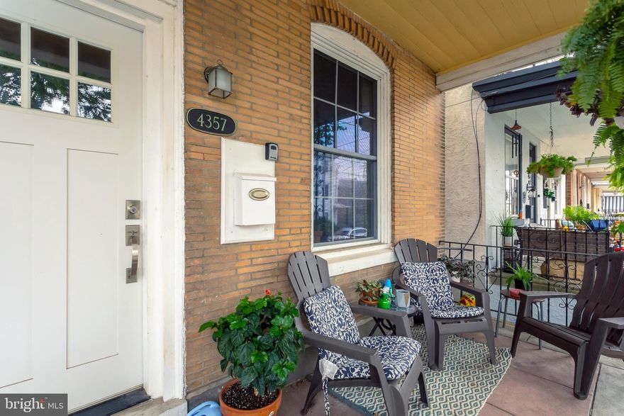 This beautifully renovated home offers 4 bedrooms, 3 full and 1 half baths and beautiful original details at every turn.  This home was completely renovated to include new baths, kitchen, central air conditioning, beautiful appliances and fixtures throughout.  Enter at the covered front porch that is perfect for entertaining or having your morning coffee.  The first floor offers an open floor plan of a large living room, dining, gorgeous kitchen with exposed brick wall and a half bath and laundry room.  Access to the large fenced in backyard is off the kitchen.  The kitchen has quartz countertops, GE appliances including a wine fridge, two-tone grey and white cabinetry, double sink and a walk-in pantry.  The 2nd floor has 2 large en suites with plenty of closet space and gorgeous full baths with beautiful tile work and double vanities! The 2nd floor offers great versatility!  The 3rd floor has 2 more bedrooms with another full bath.  Some of the bedroom features are ceiling fans, a sliding barn door and recessed lighting.  The basement of the home is unfinished, offering additional storage or workshop space.  Walk to Main St in just minutes.  Take advantage of this beautiful tree lined street in the heart of Manayunk and all its location has to offer you!