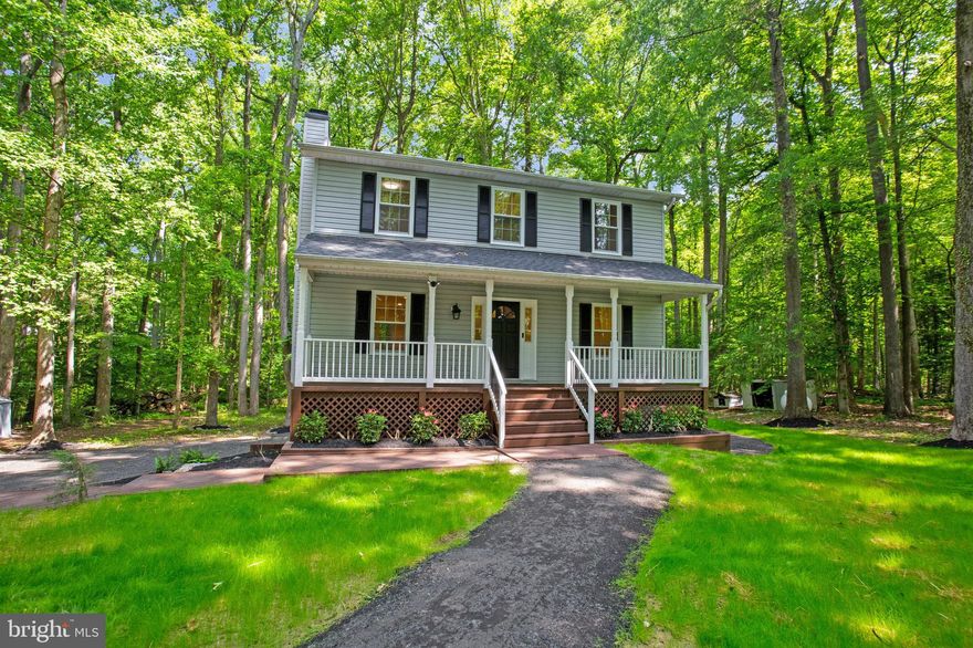 These 3 bedroom+  den/bonus room, 3.5 baths  colonial is surrounded by natural beauty! Fully updated kitchen featuring Samsung SS appliances, white cabinets and quartz counters. Hardwood floors throughout first and second floor. Basement level is fully finished with rec area, full bath, bedroom . New roof with lifetime Landmark shingles, new Simonton vinyl windows. New HVAC, electrical and plumbing fixtures, appliances, washer/dryer and much more. Enjoy large, wooded back yard and all nature that comes with that.