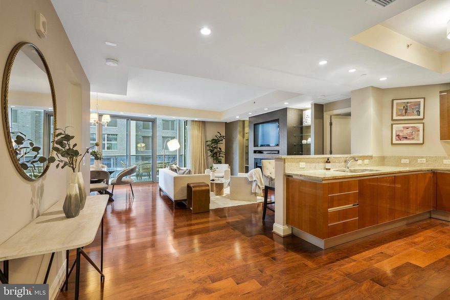 Assigned parking available!
Luxury awaits in this Turnberry Tower residence, featuring a beautifully modern design. This unit boasts a generous "D" model floor plan, comprising 2 bedrooms and 2 bathrooms, spanning approximately 1,752 sq/ft, accompanied by a spacious 314 sq/ft balcony.

The interior showcases exquisite finishes, custom millwork, and elegant marble and granite elements, creating a sophisticated living space. Enjoy the privilege of a private elevator entry into the unit from both the lobby and garage levels, ensuring convenient access and exclusivity.

Residents are treated to a range of luxurious amenities, including valet parking, a 24-hour doorman & front desk. The full-service health club is equipped with an indoor pool for relaxation and fitness.

The building also provides 24-hour concierge service, ensuring residents' needs are met around the clock. Conveniently located near Rosslyn Metro and Georgetown.

It's important to note that assigned parking spaces are not available for this unit. However, both resident and guest vehicles benefit from valet service, adding a touch of luxury to the parking experience.

Experience the epitome of luxury living at Turnberry Tower, where meticulous design, upscale amenities, and prime location converge to create a truly exceptional residential experience.