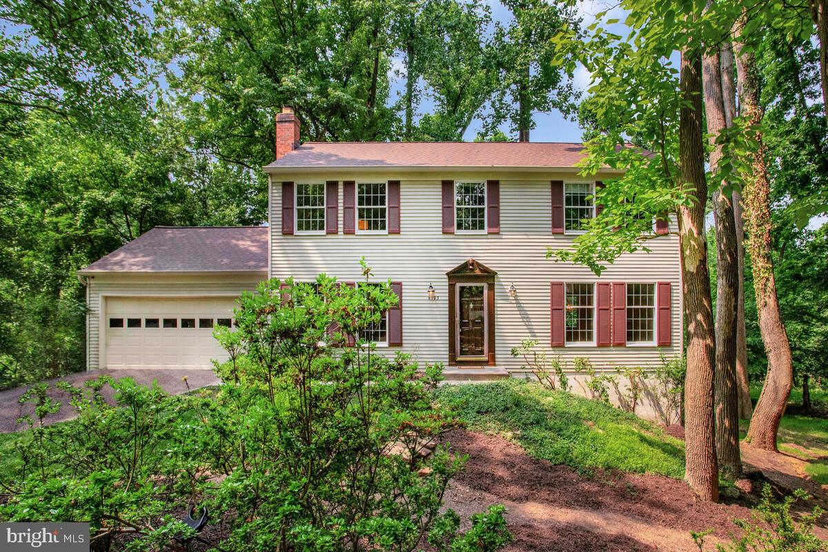 Your next home awaits - nestled on a peaceful wooded cul de sac lot, this one is an easy YES! This classic colonial home offers: spacious & versatile living & dining rooms ready for entertaining family & friends; eat in kitchen with adjoining family room with gas fireplace perfect for kicking back & relaxing; convenient main level laundry room, powder room bath, & access to your TWO car garage. Four upper level bedrooms & two full baths provide for plenty of space for all. Enjoy the walkout finished lower level recreation room - think Sunday football parties, hosting holiday get togethers, home gym, hobbies & crafts + there is a generous unfinished area too for storage! The entire interior has just been freshly painted. Brand new carpeting on the main & upper levels. New roof in 2023, new kitchen refrigerator in 2023. You will love this location so close to vibrant downtown Columbia restaurants & amenities, parks, lakes, community pools & walking trails. Cheers to new beginnings & years of wonderful memories!