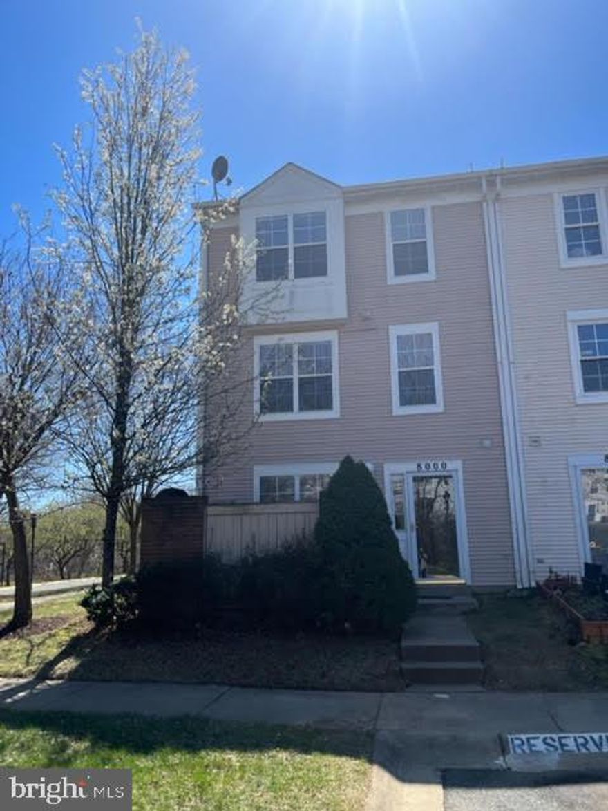Welcome to 8000 Harbor Tree Way.  This large back-to-back, 3bdrm, 2.5 bath townhome is ready for its new owner! Main level boasts a living room and large kitchen with room for a dining table. Wall to wall carpet throughout, Large owner's bedroom on 2nd level as well as an adjacent full size washer & dryer, and two bedrooms and one bath on the top level. Plenty of parking both assigned and visitor. Located across from tot lot and right off of East Village Avenue which is a popular walking trail. Close to parks, greenspace, public transportation, shopping and restaurants.