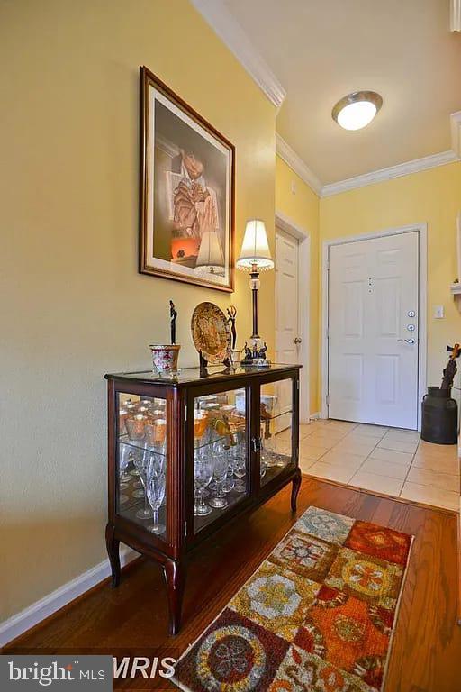 Sparkling and spacious 3BR, 2BA condo, with hardwoods, granite, ceramic, and SS appliances. Bright M/BR with walk-in closet; balcony off LR; separate laundry room, and 24 hr. security; 3BR ceiling fans. Two car parking near the corridor and elevator; short distance to club house; pool and area for grilling. What a wonderful secure community and near commuter route. Location: Close to Metro station and Dulles international airport, convenient and quick access to Routes 7, 28, 50, I-66, Dulles Toll Road, and Fairfax County parkway. Walking distance or less than a mile from the Herndon/Monroe Park & Ride and metro station, 3 miles from the Wiehle Avenue Metro station. Walking distance to Clock tower shopping Center and Woodland Park crossing shopping center, Harris Teeter, Star Bucks, some upscale eatery places.
