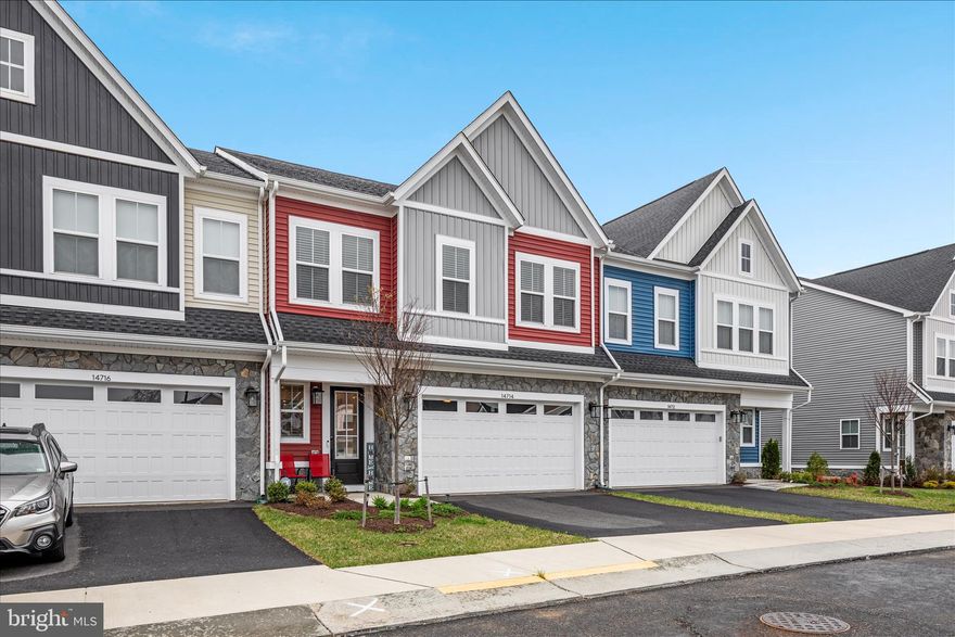 This exquisite 4-bedroom, 3.5-bathroom townhouse, built in 2024, boasts a harmonious blend of luxury and comfort, offering 2,651 sq. ft. of meticulously crafted living space. Step inside to find an open floor plan that seamlessly connects the family room and dining area, perfect for entertaining or quiet evenings at home. The gourmet kitchen features upgraded Quartz countertops, an island, and energy-efficient stainless steel appliances, ensuring culinary delights are just a heartbeat away. Enjoy the warmth of a gas fireplace in the family room, creating a cozy ambiance for gatherings. Retreat to the primary suite, complete with a walk-in closet and a spa-like bathroom featuring a walk-in shower. Additional highlights include recessed lighting, luxurious vinyl plank flooring, and a convenient main-floor laundry. The upper level features a flex bonus room perfect for continuing the entertainment with access to a roof top deck. An additional Owner's Suite and Ensuite Bath along with two spacious bedrooms and a third full bath complete this incredible upper level. Outside, the property features low maintenance landscaping and a spacious rear yard, ideal for relaxation or outdoor activities. Enjoy community amenities such as a clubhouse, a fun Pickle Ball court and an inviting outdoor pool, fostering a sense of camaraderie among neighbors. With an attached two-car garage and maintenance-free living, this home offers the perfect blend of elegance and ease. Experience the exclusive lifestyle that Robinson Manor has to offer - just minutes from Historic Haymarket boasting shops and dining galore as well as easy access to Rt29, I-66 and Rt15! - where luxury meets community.