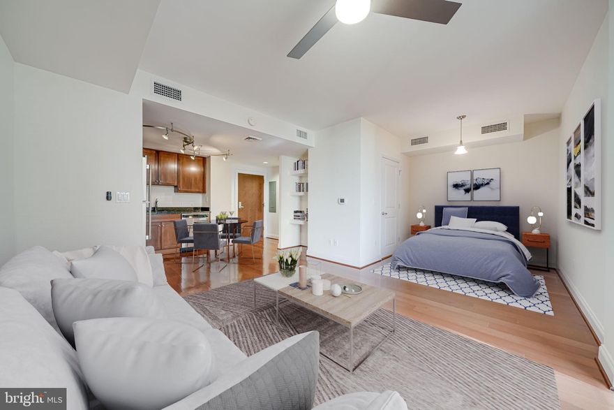 Set in the heart of Clarendon in one of Arlington’s most dynamic and walkable neighborhoods, this recently updated residence at 1020 N Highland Street, Unit 620, offers the ideal combination of location, convenience, and modern comfort. Located in The Phoenix, a highly regarded full-service condominium building, the home provides effortless access to urban living while maintaining a sense of tranquility thanks to its position overlooking the building’s serene courtyard. Just two blocks from the Clarendon Metro with nearby access to I-66, Route 50, and the George Washington Parkway, commuting to Washington, D.C. or anywhere in the region is a breeze. Steps from your front door, you’ll discover an array of beloved restaurants, cozy cafes, local shops, and essential conveniences like Whole Foods, Trader Joe’s, CVS, and neighborhood gyms—all creating a lively, pedestrian-friendly atmosphere that’s second to none.

Inside the unit, you’re welcomed by freshly painted walls and gleaming wood flooring that runs throughout the open-concept layout. The kitchen has been tastefully updated with stainless steel appliances including a full-sized dishwasher, built-in microwave, electric range, and refrigerator. Dark oak cabinetry offers generous storage while the granite countertops provide both function and elegance. The kitchen opens seamlessly into a spacious living area and a cozy bedroom nook, which includes a walk-in closet maximizing space without compromising comfort. The full bathroom is thoughtfully designed with a long granite-topped vanity and plenty of storage along with a versatile tub-shower combination. Just outside the bathroom, the in-unit washer and dryer offer a level of convenience that’s always appreciated in city living.

A private balcony overlooks the internal courtyard offering a peaceful outdoor escape while a reserved garage parking space conveys with the unit—an invaluable asset in this high-demand neighborhood. Residents of The Phoenix enjoy an exceptional suite of amenities including a rooftop pool and deck with panoramic views, a fully equipped fitness center, a media room, conference room, library, and a party room complete with a full kitchen and billiards area. The building’s lobby and common areas are immaculately maintained with secure access and responsive on-site management contributing to a sense of ease and comfort.

Whether you’re a first-time buyer, a city commuter, or someone simply seeking a vibrant lifestyle with everything at your fingertips, this Clarendon gem offers the perfect balance of low-maintenance living and elevated urban accessibility.