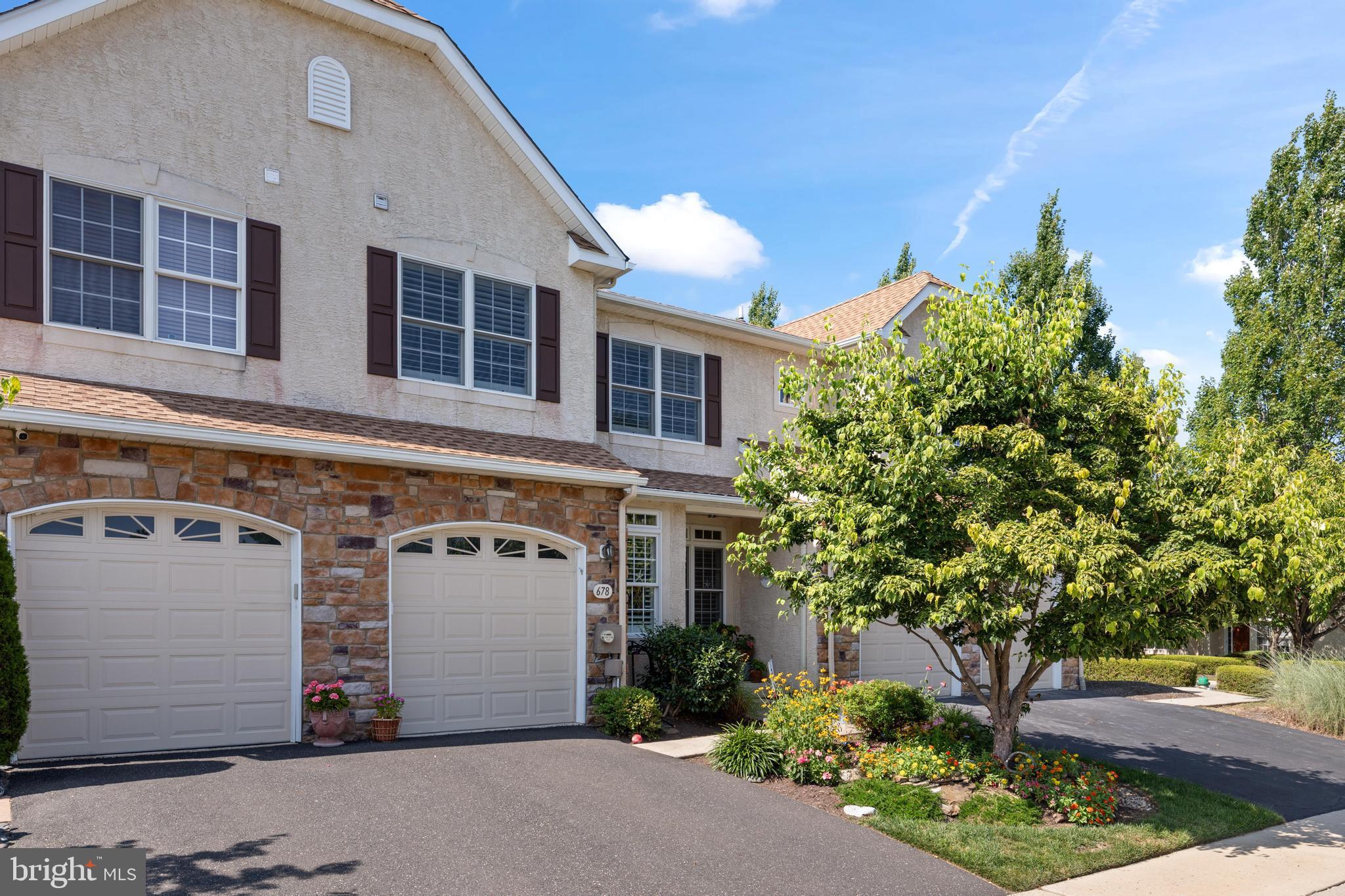 Welcome home to 678 Greycliffe Lane, part of the Greycliffe Community in the sought-after Wissahickon School District. With over 3,000 square feet of living space, gorgeous crown molding and hardwood floors throughout, this move-in ready townhome blends classic style with tasteful updates. Inside you’ll find open-concept living and dining areas, a convenient half bath, and a bright family room with soaring ceilings, abundant natural light and a cozy gas fireplace. The modern kitchen features granite countertops, newly added cabinetry and stainless steel appliances, while the peaceful deck just off the kitchen offers a perfect spot for your morning coffee. Upstairs, the spacious primary suite includes new carpeting, a walk-in closet and a dual-sink bath, along with a second bedroom, hallway bath and a convenient laundry room. The third floor boasts a versatile bonus room with skylight windows and a brand-new mini-split heating and cooling system, creating an inviting space for an additional bedroom, home office or den. A fully finished basement with a wet bar adds even more space for entertaining, plus plenty of storage. With its low HOA fees and convenient location near major roadways, shopping centers and Normandy Farm, this home offers both comfort and convenience in one beautiful package. Schedule your showing today!