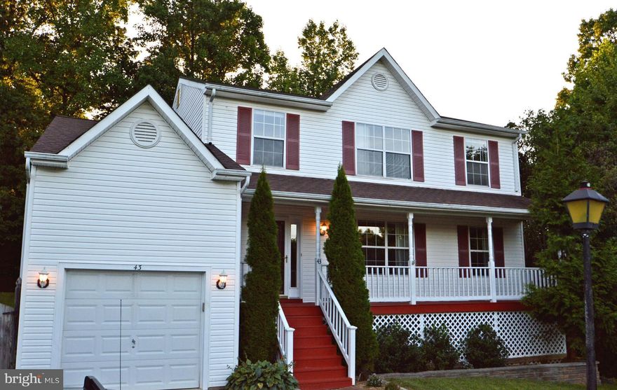 Ready to move in home in a neighborhood area, fire place, open floor kitchen with breakfast nook and dining room, foyer hardwood with staircase, Master bedroom with walk in closet & balcony, two levels deck, large fenced in yard surrounded with mature trees for privacy, has play house and a shed. The fully finished walkout basement has a wet bar, well maintained, close to 95 and VRE, must see.