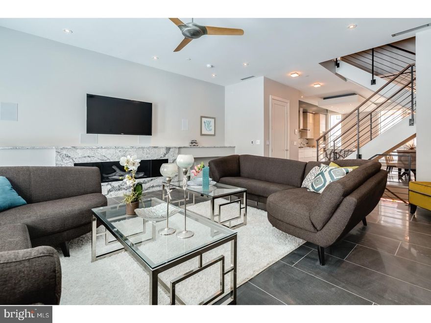 One of a kind New Construction with Elevator, 2-car garage, 4 Decks including two Roof-decks, Smart-home tech system, 4600sq' of Luxury and most finely appointed details in the city. Liberty Estates  Townhomes has it all. Included in this sophisticated home is a theater room, and a game room with large wet bar that's perfect for entertaining. The living room, dining area and living room has heated floors. The wide open and extra wide living area has a built in fireplace with stone ledge, and this magnificent space spills onto a rear tiled deck that will make you feel like you are in Miami. The kitchen is spectacular, with Sub Zero and Wolf appliances, custom Italian cabinetry, custom counter tops including a HUGE island with cascading waterfall stone edge and a custom floating ceiling with accent lighting. The extra wide, 20' wide floor plan allows for a huge dining area right next to the kitchen. The interior iron railing system continues throughout the home along an elegant Black Walnut wood staircase. The roof decks are equipped with a kitchenette with sink, fridge and built in grill. The private deck off the master suite, and the deck off the living room supply a ton of outdoor square footage,  totaling over 900 Sq feet. All of the bedrooms have great space and have ample walk in closets and accompanying bathrooms with the finest Grohe and Kohler finishes. The full floor master suite has it all, a six foot Kohler soaking tub, heated floors, double vanity, glass tile shower, deck and huge closets. Each bathroom is unique and has only the best materials. The woodwork throughout the home is stunning- including the custom baseboards and solid wood doors t/o. This may be the most well thought out home in the city. Not one inch of space has been wasted. Come visit our 100% complete and ready to be lived in Model home. Still time to customize the other homes in the development. 10 year tax abatement pending!!