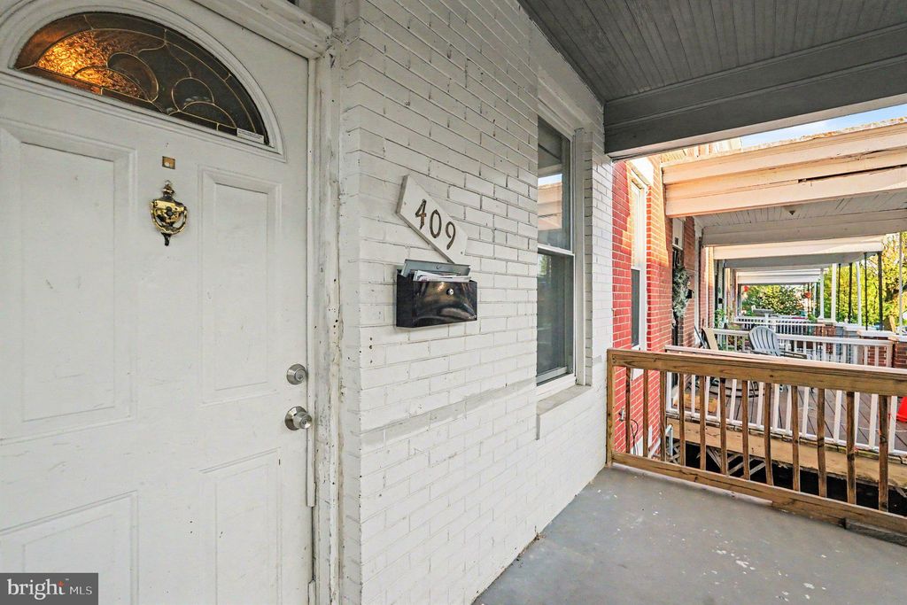 Photo of 409 N Edgewood Street, BALTIMORE, MD 21229 (MLS # MDBA2206198)