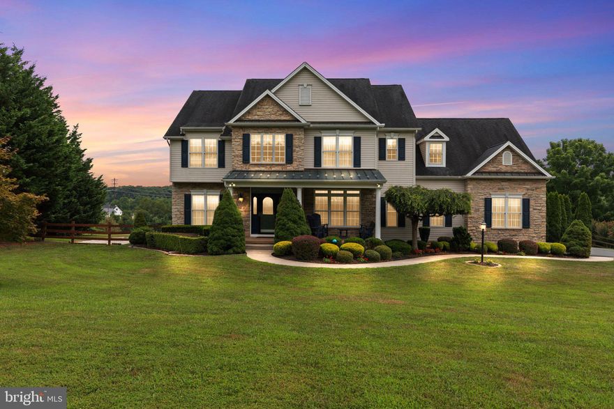 Discover an extraordinary residence meticulously crafted by Gast Construction, nestled in the heart of north Harford. This home establishes a new benchmark for luxury living with its array of distinctive features, including an impressive master suite with dual walk-in closets, a first-floor au pair suite with a full bath, a chef’s kitchen, game room, oversized three-car garage, mudroom with washer and dryer, and a resort-style heated saltwater pool with a pavilion.

From the moment you arrive, the home captivates with its stunning curb appeal. Architectural excellence with striking peaks and pitches enhance the home's allure. Meticulously groomed landscaping adorned with custom lighting guides you along the curved path to the inviting front porch and grand entrance.

Step inside to encounter a majestic two-story foyer, an elegant double staircase with balcony, and a great room featuring a striking natural stone fireplace framed by dramatic arched windows. The meticulous craftsmanship of the original owners is apparent throughout, highlighted by two-story high coffered ceilings, custom millwork and built-ins, and impeccably finished hardwood oak floors that create an expansive and inviting atmosphere.

The kitchen is a haven for culinary enthusiasts, boasting state-of-the-art stainless steel appliances, abundant counter space, and storage. Adjacent to the kitchen, a spacious breakfast nook offers panoramic views of the property. The thoughtfully designed mudroom, complete with full-size washer and dryer, utility sink, and ample storage, combines functionality with refined aesthetics. A spacious first-floor bedroom with full bath is ideal for entertaining guests, or provides an option for a first floor owner’s suite.

The second-floor owner's suite epitomizes luxury and comfort with high tray ceilings, a cozy sitting area, two expansive walk-in closets, and a lavish bath featuring a Jacuzzi jetted tub, standalone shower, and heated flooring. Three additional generously sized bedrooms, including one with an attached full bath and walk-in closet, provide spacious retreats for family members. An additional full-size bathroom on the second floor ensures convenience and enhances privacy.

Designed for seamless entertaining, the sweeping floor plan effortlessly connects the formal dining room to a massive finished lower-level club room with powder room. The pub-like space opens to a private oasis with a professionally landscaped patio and deck overlooking the pool area and custom pavilion. Every detail harmonizes comfort with refined elegance, offering not just a residence, but a lifestyle that embodies sophistication and relaxation.  A new lifetime roof and radon system were just installed!

Discover the charm of this home, ideally situated in the serene, close-knit rural community of northern Harford County. Enjoy easy access to Bel Air, APG, Hunt Valley, and York, making commuting a breeze. Outdoor enthusiasts will delight in the abundance of nearby parks featuring scenic walking, hiking, and biking trails, as well as creeks and rivers perfect for fishing, kayaking, and boating. The area also boasts plenty of recreational fields, programs, and golf courses.

Families will appreciate the presence of exceptional public and private schools within the community. You’ll find a variety of amenities just minutes away, including local shops, farm stands, breweries, wineries, restaurants, churches, and a library. 

As the holiday season approaches, get ready for a unique tractor parade that you can enjoy right from your front lawn, along with a spectacular fireworks display during North Harford High School's Homecoming Festival. This home truly offers a wonderful blend of tranquility, community spirit, and convenient access to everything you need!

Best of all, this property is not governed by an HOA and is part of a rural community filled with wonderful, welcoming residents. Don’t miss the opportunity to make this your new home!