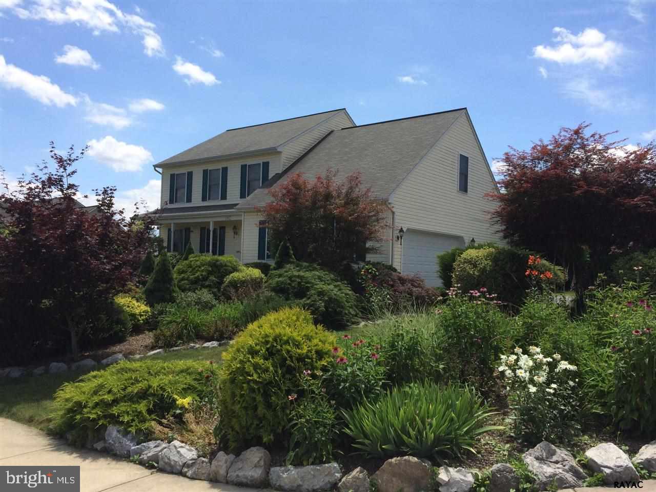 Beautifully maintained home on corner lot with exceptional landscaping. Enjoy your own little private retreat minutes from everything. 4 bedrooms and 2 1/2 bath 2 story colonial with large eat in kitchen with open floor plan and walk out basement.