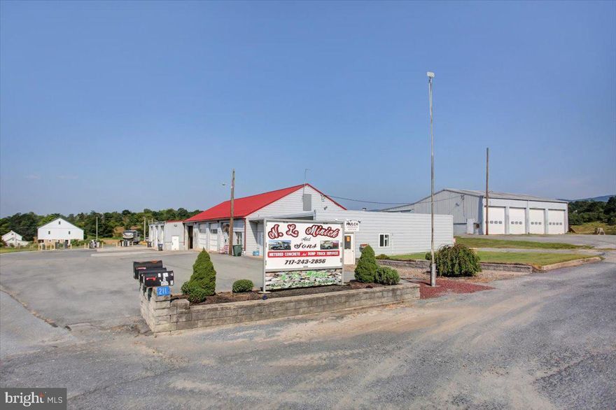 This versatile 13,686 sq ft commercial property features three well maintained buildings situated on 3.893 acres of prime land. The property offers ample parking for staff, clients and or customers, along with multiple garage bays ideal for fleet storage, equipment, or service operations. Additional features include a fuel island for on-site refueling and flexible office space that can be adapted for a variety of business uses.
With its spacious layout, excellent accessibility, and room for expansion, this property is perfect for a growing business, multi tenant investment, or a company needing a blend of administrative and operational space.