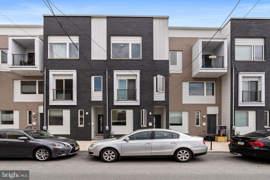 🏡 Welcome to the exceptional N5Square Townhouse, with a stylish and modern residence priced to sell, complete with the convenience of parking included at the back of the unit. This home features a handsome and durable exterior finish, promising both aesthetic appeal and longevity.

🏠✨ Enjoy the financial benefits of approximately three years remaining on the tax abatement (buyer to verify). 💰📉

🍽️ Inside, the protected doorway leads into an inviting outdoor vestibule. The beautifully designed kitchen boasts elegant granite counters and an island with seating, perfect for culinary enthusiasts and gatherings. Adjacent to the kitchen, the dining area is ideal for both casual and formal dining experiences. 🥂

💡 The bright, open-concept living area on the first floor is complemented by a convenient half bath and offers a welcoming space for relaxation and entertainment. The basement, ready to be finished, provides an excellent opportunity to customize additional living space to suit your needs. 🛋️🔨

🛏️ The second floor features two well-sized bedrooms, each with ample natural light and closet space, along with a hall bathroom and a laundry area for convenience. Ascend to the third floor to discover the luxurious primary bedroom, complete with an en suite bathroom and abundant closet space. 🚿👗

🌆 Cap off this incredible property with a beautiful roof deck, where you can enjoy stunning views and create your personal outdoor oasis. Don't miss out on this exceptional opportunity—schedule a viewing today and experience all this remarkable townhouse has to offer! 🌇🌿