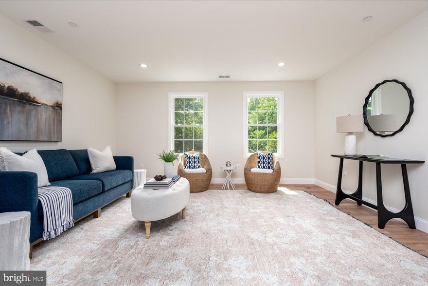 This home offers a flexible layout paired with contemporary finishes. The entry level features a half bath and laundry area. Upstairs, the kitchen with stainless steel appliances opens to the dining and living areas, creating an easy flow for everyday living and entertaining. The upper level includes four rooms currently used as bedrooms, two full baths (one being a primary bedroom ensuite), and a desk nook. The primary suite offers a generous closet and ensuite bath.

Additional features include updated siding, roof, a detached garage and a newly added partial privacy fence. The Property is serviced by holding tanks. Conveniently located near Bacon Ridge Natural Area and downtown Annapolis, with easy access to shopping and major commuter routes.