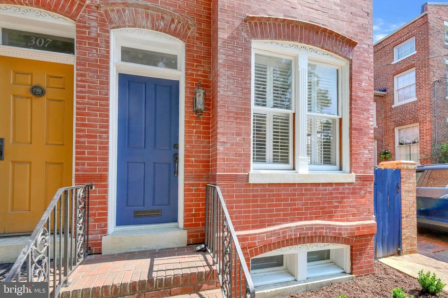 *** Offer deadline set for Monday, June 19 @ 5pm *** Amazing opportunity in Old Town Alexandria. Built in 1890 this brick townhouse is two blocks from the Potomac River and King Street. It features 10 ft ceilings on the main floor, beautiful mouldings, hardwood floors and refurbished gorgeous windows with plantation shutters. The main floor offers living room with fireplace, built-ins and is open to the dining room for fabulous entertaining. The kitchen overlooks the darling  private patio, has quartz countertops, and a spot to enjoy your morning coffee. Upstairs there are two bedrooms each with their own private bath. As you walk down the hall to the primary bedroom, sun shines in from the newly replaced skylight. Entering the tranquil primary suite you have lots of light with beautiful trees swaying just outside the windows. The primary bath has a large soaking tub with more amazing windows! It's hard to believe this home is 133 years old being in such wonderful condition. The owner has, in cooperation with the Old Town BAR (Board of Architectural Review) replaced the front and back doors, refurbished the windows with all weights and pulleys restored, the exterior brick was repointed by a knowledgable expert. It is truly move-in ready. You can then enjoy all that Old Town has to offer barely two blocks away. Amazing restaurants, shops, entertainment, art studios, waterfront paths, and so much more. Take the water taxi down into Georgetown for dinner, or head south down the Potomac River to George Washington's home Mount Vernon. This is amazing living in an exceptional location.
