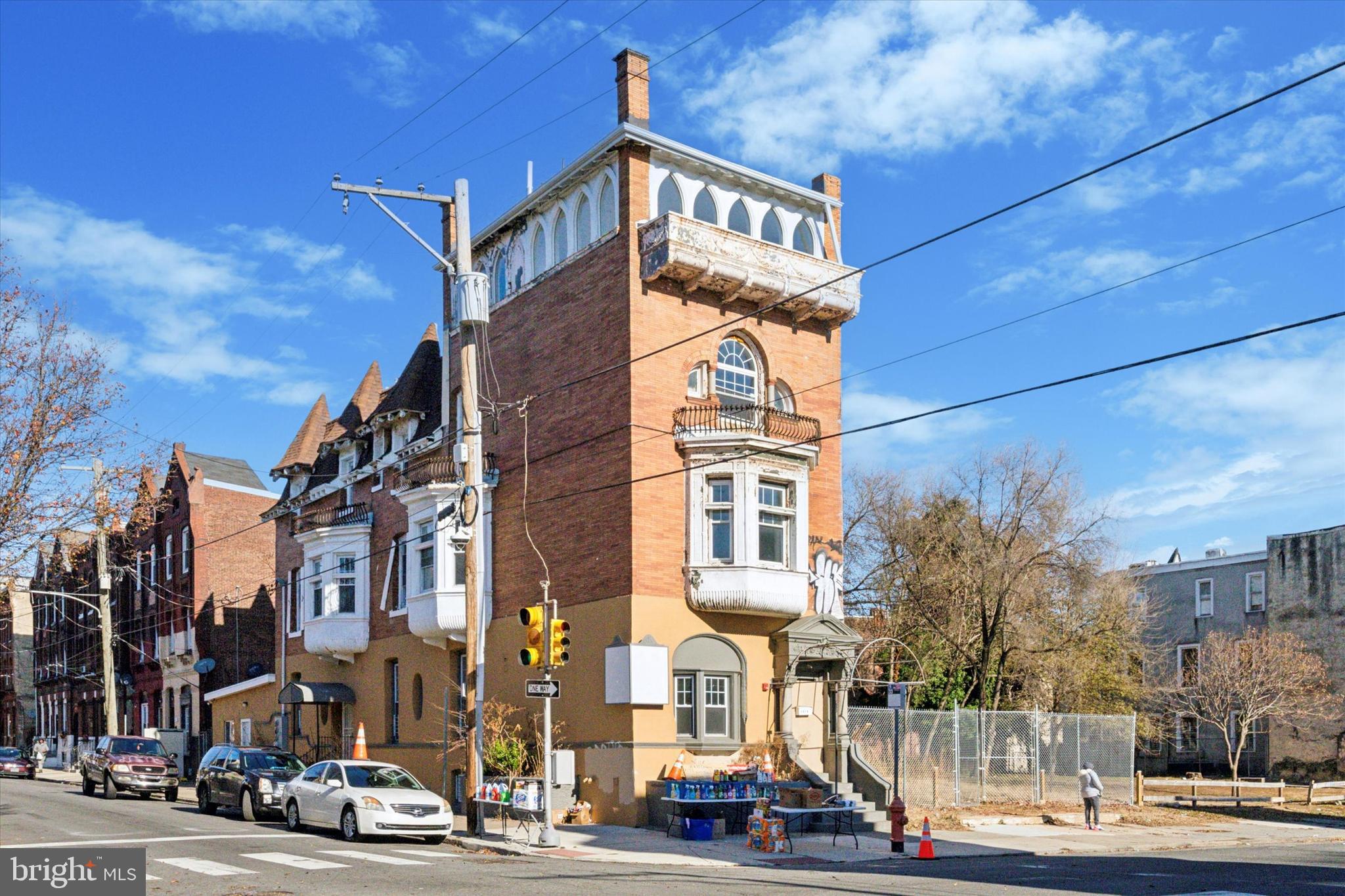 ASK ME ABOUT A CONVENTIONAL-LIKE LOAN FOR THIS UNCONVENTIONAL PROPERTY! Own a piece of Philadelphia’s history AND earn instant equity when you buy this quadplex just 6 blocks from Temple University. Rent the units out, and now you have cash flow! Unit 1 is a 3 bed/1.5 bath, bi-level unit. Unit 2 is a 2 bed/2 bath unit. Unit 3 is a 3 bed/3 bath unit with the most amazing panoramic view from the 4th story. Unit 4 is a converted garage to the rear and has 1 bed/1 bath. Projected total rents are $7,500 per month. Unit 1- the commercial or 3 bed/1.5 bath unit- is projected at $2,250. The 1 bedroom is projected at $1,250. The 2 bedroom is projected at $1,750. And the 3 bed/3 bath unit is projected at $2,250. Beautifully renovated and 90% of the way to get the Certificate of Occupancy. The seller was quoted $15,000 to install the water and gas lines to the property and $30,000 to install the sprinkler system. The 1st floor is zoned for commercial use and would require a $20,000 chair lift to meet code, OR if you prefer to get a variance to use the building 100% residentially after closing, you can pocket the difference. There are just a few other touches needed to rent the units, including installing electric meters and some appliances. The 2022 Appraisal gives a $1,150,000 valuation after the building is complete and $625,000 As-Is. This property is truly a must-see.