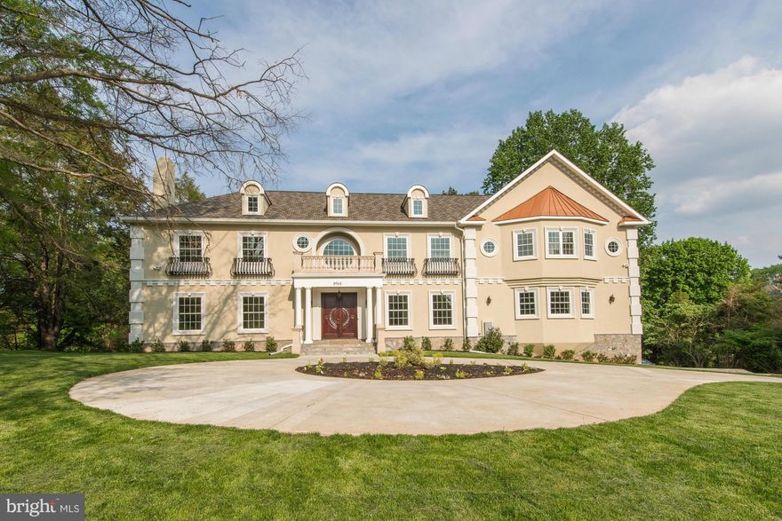 Exquisite manor features European craftsmanship blended w/ modern amenities. A flowing floor plan w/ large open formal areas allow for grand & elegant entertaining & provides for cozy, private family living. The main level has wide width mahogany floors, rich moldings & ambient lighting. Lower level has walk-out access to a huge backyard & has 2 large rec rm areas, wet bar & bedroom with bath.