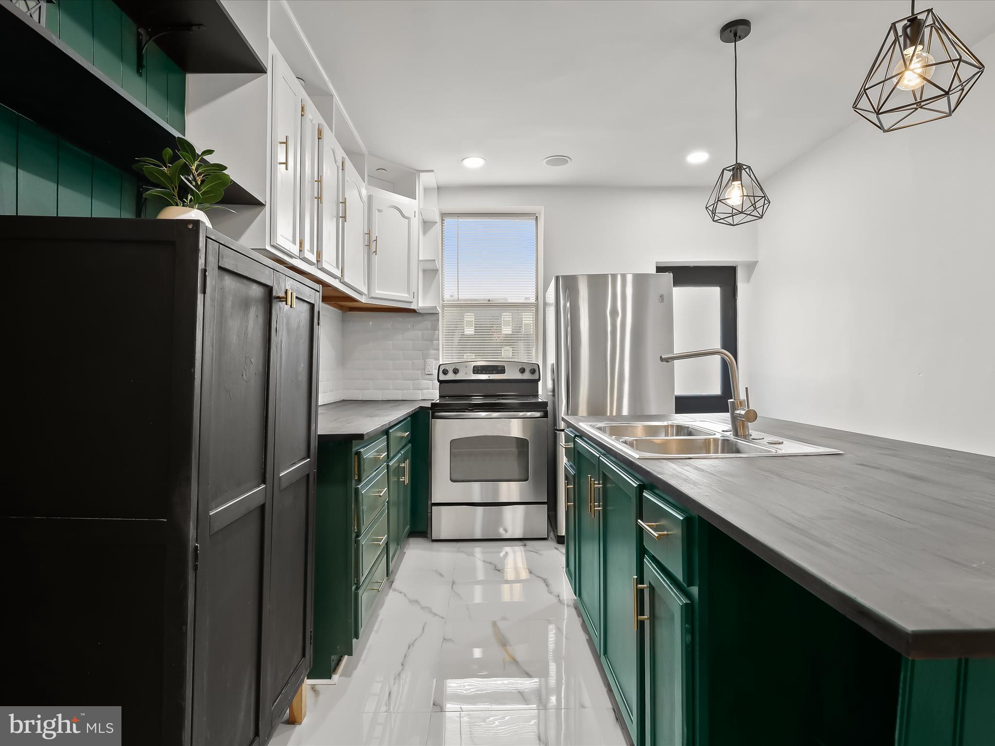 Welcome to your charming new home, a traditional townhouse built in 1915, where classic architecture meets modern comfort. This inviting residence features 4 spacious bedrooms and 2 full bathrooms, providing ample space for relaxation and entertaining. The interior layout offers a perfect blend of functionality and style, with new Central Air Conditioning and an unfinished basement that presents endless possibilities for customization—transform it into a recreation room, home gym, or additional storage space to suit your lifestyle. Enjoy the convenience of on-street parking, ensuring easy access for you and your guests. The surrounding community offers a variety of outdoor activities and amenities to explore. With its prime location and timeless charm, this townhouse is not just a property; it’s a place where you can truly feel at home. Just a few blocks from Johns Hopkins- don’t miss the opportunity to make this delightful residence your own. Schedule a visit today and envision the wonderful moments that await you in this lovely space!