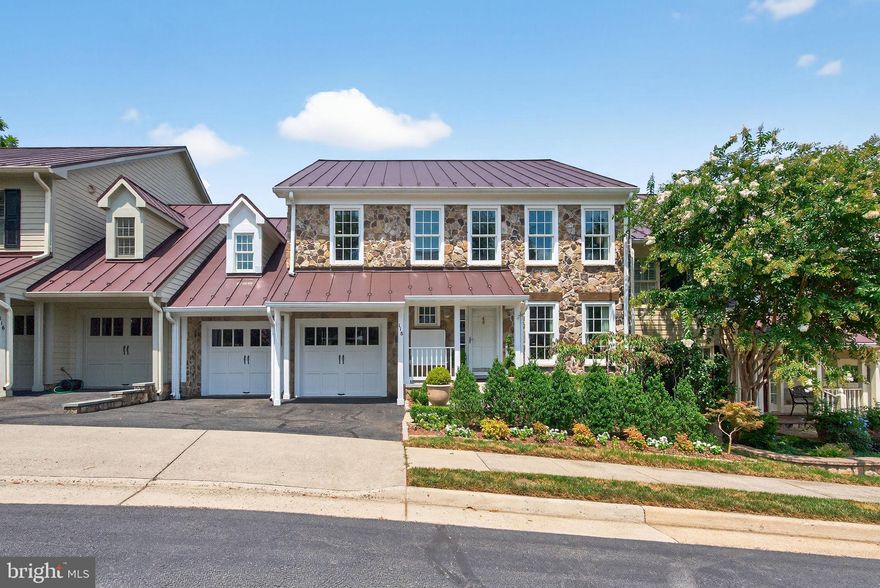 A must see!  The views of the rolling hills and farmland from this home are spectacular!
  A stunning Stone Town Home with 4 bedrooms and 4 en-suite bathrooms including a half bath on main floor.  This home comprises three stories all overlooking a professionally landscaped English Garden and rolling hills beyond.
This gem sits in the heart of historic downtown Middleburg, VA within walking distance to all the fun shops, restaurants and museums.
     This home boasts hardwood floors throughout and elaborate moldings along with many new renovations as well as a two- car garage.
The spacious foyer leads past a sitting room / office to a light-filled living room. This room has glass doors that open onto a balcony and a side garden terrace lined with bluestone. A well appointed stone gas fireplace makes for cozy winter evenings.   From the living room, one can appreciate the open floor plan. Great for entertaining and mingling with your family and friends.
The open dining room also has glass doors leading out onto a balcony. It has a custom built-in sideboard with glass fronted doors and an accent wall lined with millwork painted in a high lacquer finish.
The kitchen’s wooden cabinets are set off against a contemporary backsplash of individually cut gun-metal tiles. The wrap around polished black granite counter tops add just the right amount of glitz.
     Upstairs are 3 renovated bedrooms all opening onto a spacious “gallery” style foyer. All bedrooms have their own en-suite full bathrooms. The two guest bedrooms boast custom built-in dressers and large closets.
The primary bedroom features its own fireplace; glass doors opening onto a balcony; and a cathedral ceiling. The primary has 3 closets, one being a full walk-in closet. The primary bathroom has marble heated flooring along with a marble twin shower. The double sinks are each topped with black polished granite.
A separate sitting room with custom built-in bookshelves is connected to the primary  bedroom.
A separate laundry room with washer/dryer and built in ironing/steaming station is also on the upper level.
     The light-filled lower level was renovated in 2025 with hardwood flooring throughout. It has a spacious TV/Family Room that opens out to a fenced in back yard.  The lower level bedroom with full en-suite bathroom also has its own private opening to the landscaped back yard.
A must see Gem in the heart of Middleburg!
Virtual tour, video and floor plans coming soon !