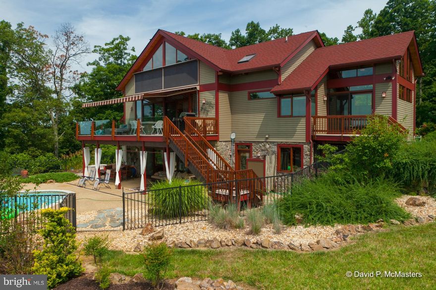DEEELUXE SPACIOUS, Acorn Post + Beam home in the nicest big lot subdivision in the County. Spectacular 50 mile views of Blue Ridge Mtns, Shenandoah Valley and River right below home. In-ground pool w/river view! Geothermal heat + cooling! Hickory floors, mahogany doors and trim. 1st Floor Master Suite. Finished bsmt. 5 gar. spcs. 2 FP, Gourmet kit. 2 miles from VA border, 15 min to Leesburg. MARC