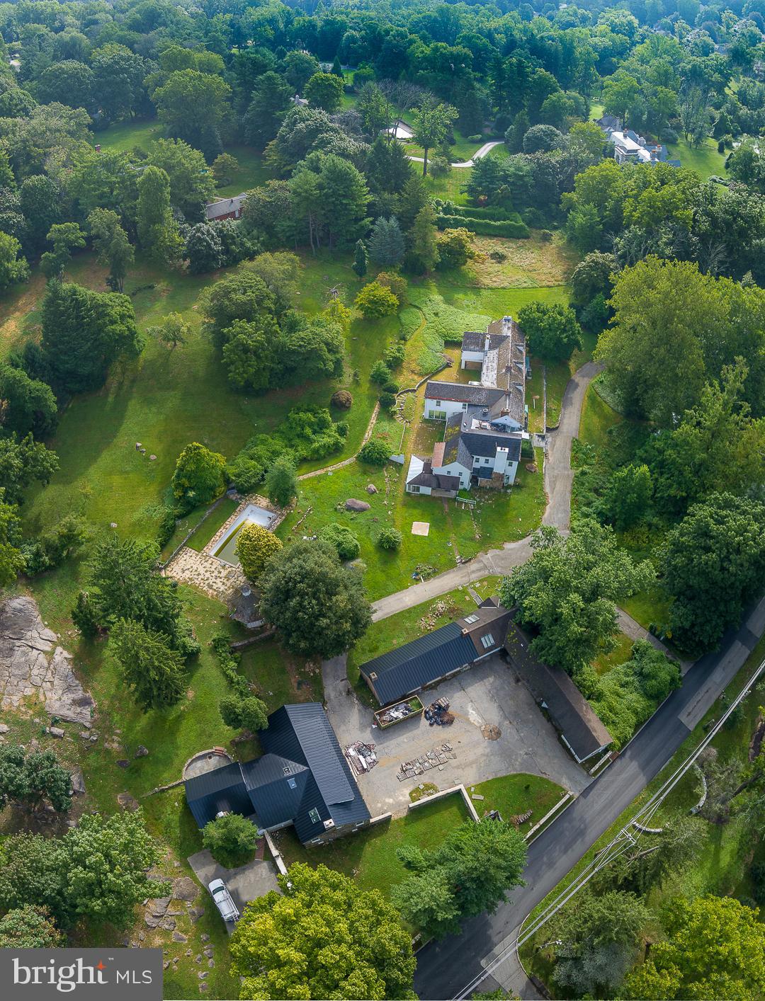 This exceptional Villanova property offers a unique opportunity to own a historic estate on 4 acres in the sought-after Lower Merion School District. You have the choice to either renovate the existing estate, which dates back to 1704, or build a new custom home further up on the lot.
The grounds are beautifully landscaped with mature plantings, providing a peaceful setting for your future home. Conveniently located close to shops, restaurants, schools, and major roadways, this property offers both privacy and accessibility. The included rendering showcases the quality of work from a previous project by the same builder, giving you a glimpse of the potential to create a home that suits your style and needs.