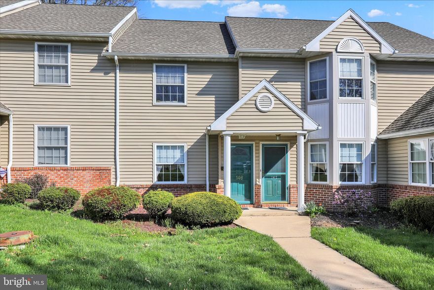 This Stone Hill Farms first-floor unit is available for immediate move-in. This cozy home offers convenient  first floor living and features two bedrooms, two full bathrooms, a one-car garage, and a rear patio. The open floor plan includes a spacious living room with a gas fireplace and a glass patio door leading to the patio and exterior storage area. The dining room features a large pass-through/breakfast bar to the kitchen, providing an open feel while enhancing functionality. Double doors open to the primary bedroom, which includes a walk-in closet and a private full bathroom with tile flooring. A second bedroom, a full hall bathroom, and a laundry area with direct access to the garage complete the layout. Conveniently located in Spring Township, the property is in close proximity to near major roadways, shopping, schools, restaurants, and other amenities. If you're looking for first floor living in a super convenient area within 5-10 minutes of just about anything, this home may be for you!