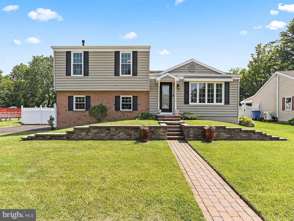Welcome to this meticulously maintained home. Upon entering you will find that the home has been freshly painted throughout. There is crown molding in each room as well as chair rail in the dining room. The kitchen has granite countertops and a window above the sink to enjoy the view of the private backyard. The sellers have replaced all the windows with Pella windows. The family room is located a few steps down from the kitchen and has a gas fireplace for cozy winter evenings. The space also provides access to the powder room and laundry room. The family room opens to the private back yard where you will find a lovely inground, saltwater pool and a large shed to hold lawn equipment. A few steps down from the family room is the fourth bedroom, spacious office and pantry area. Upstairs are three nice sized bedrooms with the primary bedroom having an en suite bathroom. This is a lovely home that offers comfort and style. The pool is serviced monthly (clean filters, check and test water, add any needed chemicals). The service has been paid for the season and the only additional cost for this season would be the needed chemicals. Also, the driveway was repaved in 2022 and resealed in 2024. There is a lifetime warranty for the driveway as long as the resealing is performed every two years. That warranty passes to the buyer. There is also a lifetime warranty for the Pella windows which passes to the buyer. This is truly a move-in ready home with nothing to do but unpack!