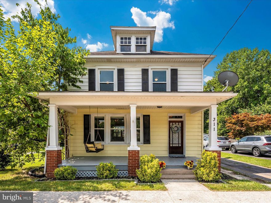 OFFER DEADLINE: MONDAY 7/17 @ 3 PM  This attractive 3-bedroom, 2-bath 1920 Craftsman-style Four Square home was completely remodeled just six years ago by the current owners.  All of the work was completed under the FHA 203k program with licensed contractors and rigorous inspections.  The big-ticket items have already been done for you.  Gone is the boxy kitchen in the corner.   The wall between the kitchen and dining room was removed and a brand new fresh, white kitchen with new cabinetry, new appliances, and a farmhouse sink was built in what used to be the dining room, expanding the kitchen/eat-in area to the entire width of the house.  Chat with your guests from the kitchen island as it opens into the living room as well.  The gorgeous pencil hardwoods were refinished throughout the main floor and the historic deep-stained Craftsman woodwork was preserved...as it should be.  Two entire HVAC systems were installed, a system in the basement to cover the main floor and a system in the attic to drop down to the upstairs.   This enabled comfortable forced heat and air to all living areas without running ductwork and bulkheads throughout the house.  The electricity and plumbing were completely updated.  All new windows were installed in the living areas.  Newer sump pump and radon remediation system as well.  The original wooden doors throughout are begging to be brought back to their original glory, so there are still things to do.  Then, let's talk about the yard.  This expansive yard goes all the way back to the Funkstown Park where events occur throughout the year.  Enjoy the covered wagons passing through or the Battle of Funkstown re-enactment, the Food Truck Festival and Olde Tyme Christmas, and regular sporting events from your balcony.  The park includes tennis courts, ball fields, playground equipment, pavillions, and lush walking trails.  Although they never pursued it, the Town of Funkstown granted permission for the current owners to install a gate from their backyard to the park to avoid walking around to other gates.   The detached two-car garage with original sliding doors can solve all of your storage needs and could serve as a generous workshop as well.  Professional photos coming next week.  Open House from 12:00 p.m.- 3:00 p.m. to coincide with the Battle of Funkstown Celebrations on Saturday, July 15 at the park.  Follow the signs by the tennis courts to get in the back way.