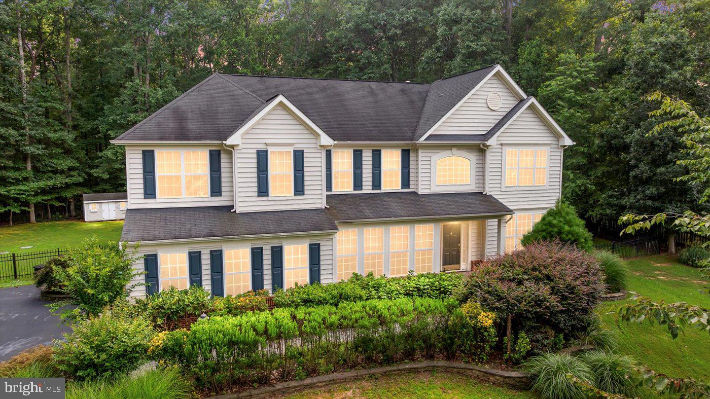 Welcome to this stunning and spacious colonial home, nestled on a beautifully landscaped 1.45-acre private lot. Boasting over 5,500 finished square feet across three fully finished levels, this home offers the perfect blend of classic elegance and modern comfort — truly an entertainer’s dream!
Inside, you’ll find 4 spacious bedrooms and 4.5 baths, with an additional non-conforming 5th bedroom in the fully finished basement. Rich hardwood floors flow throughout the main-level dining room, living room, entry hallway, and the entire second floor, including all bedrooms, creating a seamless and sophisticated feel. The oversized kitchen is a chef’s delight, featuring abundant cabinetry, expansive counters, and a bright eat-in sunroom that opens to the backyard. The adjacent family room offers a cozy gas fireplace, perfect for relaxing evenings. The basement provides a versatile retreat with a wet bar, mini refrigerator, full bathroom, carpeted flooring, and a bonus NTC bedroom—ideal for guests, a home office, or gym. The washer and dryer (just 3 years old) will convey. Step outside to your private backyard oasis, complete with a hardscape patio, built-in firepit, and a storage shed that conveys — ideal for gatherings or peaceful evenings under the stars.
Don’t miss this rare opportunity to own a move-in ready home with space, style, and serenity — all in one exceptional package.