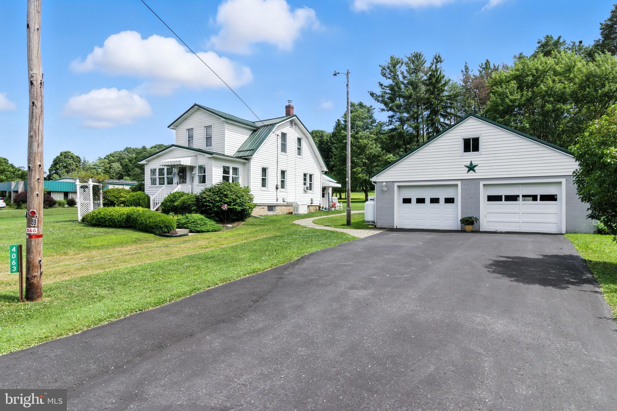 Fall in love with this beautifully renovated 2-story home perfectly situated on a peaceful 1.342-acre lot. This charming home features two spacious bedrooms, a versatile bonus room- perfect as a family room, playroom or guest space. This house also features a dedicated home office. This gem has modern updates throughout with all the attention to detail and a Generac whole house generator for reliable backup power. This home offers a 2-car detached garage with a bonus space above- ideal for a studio, home gym or additional storage. You will find a clean basement for additional storage and two oil tanks filled for the upcoming cold months. The large lot offers plenty of room to relax, garden or entertain. This house has a ton of updates, New Roof, New Windows, New Furnace, New Hot Water Tank, New Carpeting, New Chimney Liner. All the big-ticket items are taken care of! This house is just waiting for you to call it home.