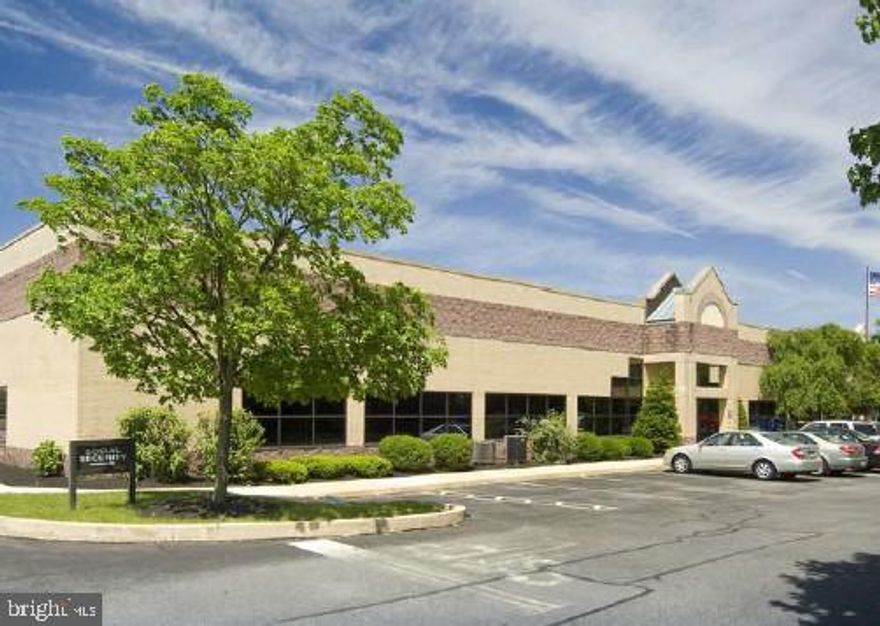 Attractive office suite features multiple private offices, a large open work area, and two bathrooms. The suite has large windows and an abundance of natural light. There is an option to customize this plan and do a complete renovation while the neighboring space is being renovated and to pick your design and finishes.